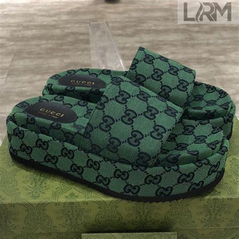 gucci gg wolf slides|green gucci platform slides.